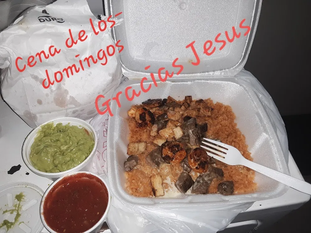Chicken Shrimp Steak over Bed of Rice with Queso on Top Sirloin